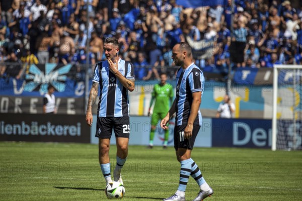 Football 3rd division, season 2024/25, matchday 2: Waldhof Mannheim vs Viktoria Köln. Picture: Adrian Markus Fein and Rico Benatelli (Waldhof Mannheim)