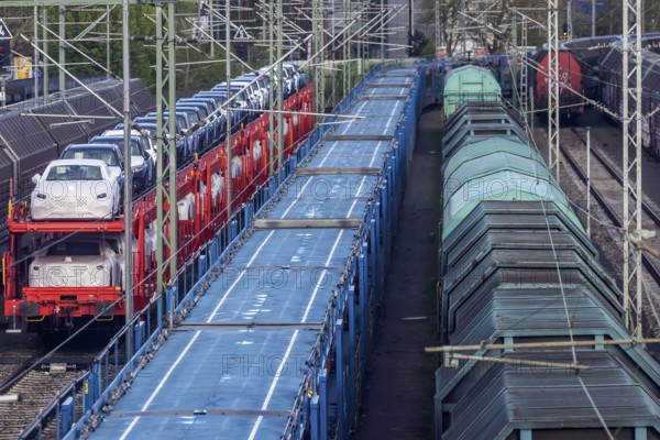 Sindelfingen railway station. Goods trains parked on the tracks. Automotive RailNet. Car transport by train, new Mercedes cars. Baden-Württemberg, Germany, Europe