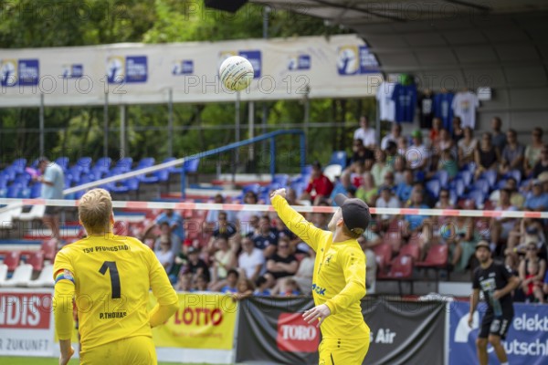 Fistball: TSV Pfungstadt against Union Tigers Vöcklabruck (IFA 2024 Fistball World Tour Finals Mannheim, Final) . Picture: Sebastian Thomas (10) serves for Patrick Thomas (1), Pfungstadt