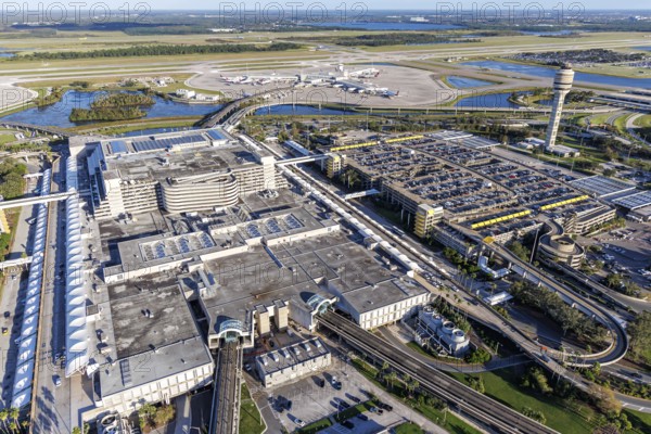 Aerial view of Orlando International Airport with Terminal Concourse Airside 4 and Tower in Orlando, USA, North America
