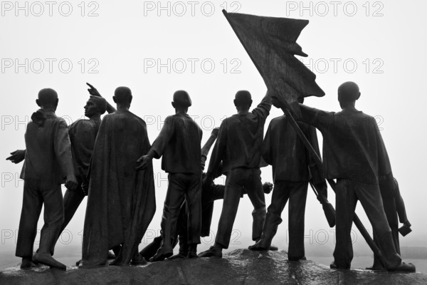 Group of figures from behind the beech forest memorial by Fritz Cremer, beech forest Memorial, Weimar, Thuringia, Germany, Europe