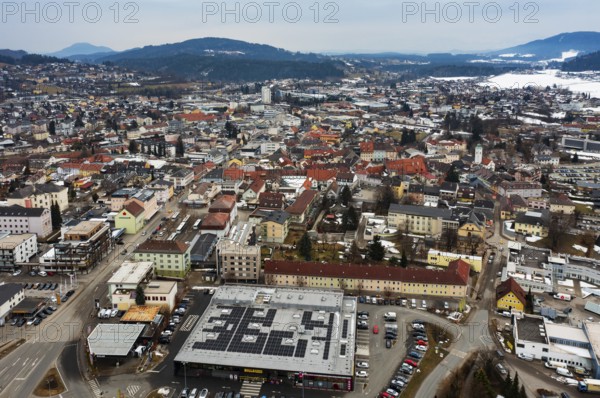 Drone shot, townscape with residential buildings and shopping centres, town view, Feldkirchen in Kärnten, Carinthia, Klagenfurt basin, Austria, Europe