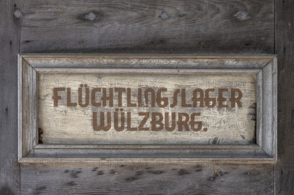 Sign at the entrance gate of Wülzburg Castle, reminder of the refugee camp from 1952 to 1968, Wülzburg Castle, Weissenburg, Middle Franconia, Bavaria, Germany, Europe