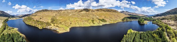 Panorama of Mountains over Loch Iubhair from a drone, Crianlarich, Highlands, Scotland, United Kingdom, Europe