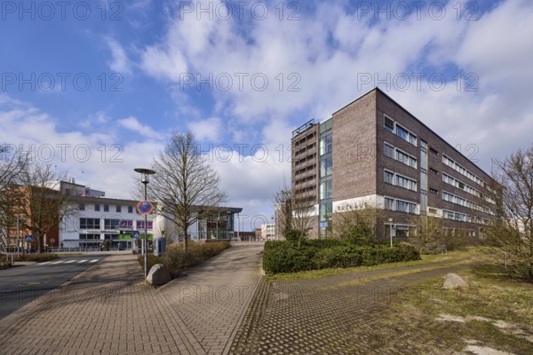Town hall, trees, hedge, lantern, pavement made of concrete paving stones, asphalt road, blue sky with cumulus clouds, town hall square, Garbsen, Hanover region, Lower Saxony, Germany, Europe
