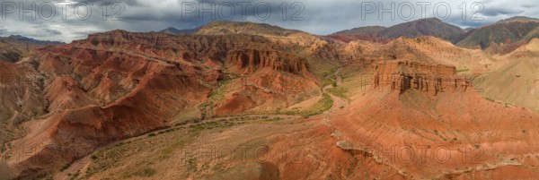 Eroded mountain landscape, canyon with red and orange rock formations, aerial view, Konorchek Canyon, Chuy, Kyrgyzstan, Asia