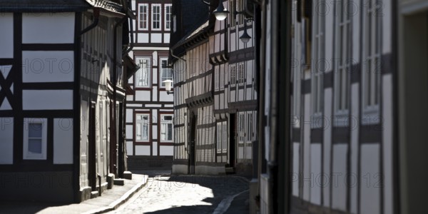 Narrow alley with half-timbered houses and cobblestones in the old town, UNESCO World Heritage Site, Goslar, Lower Saxony, Germany, Europe
