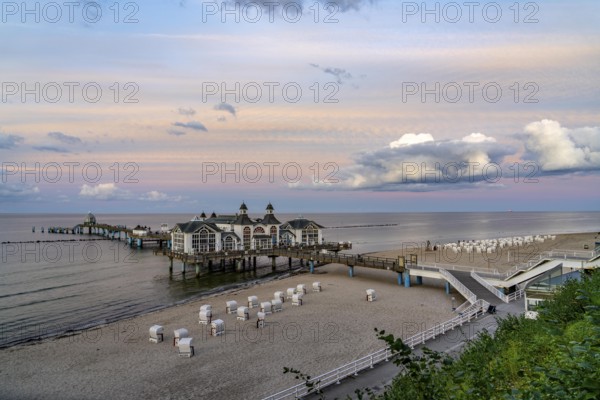 The pier of Sellin, evening mood, sunset, 394 metres long, with restaurant, jetty, beach chairs, island of Rügen, Mecklenburg-Western Pomerania, Germany, Europe