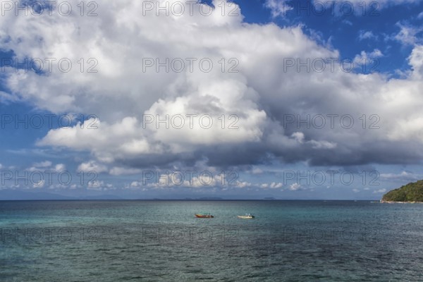 Tropical sea and sky with clouds in the marine reserve. Malaysia
