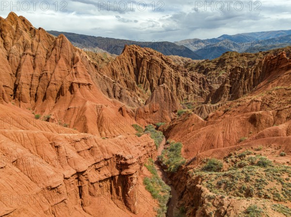 Eroded mountain landscape, canyon with red and orange rock formations, aerial view, Konorchek Canyon, Chuy, Kyrgyzstan, Asia