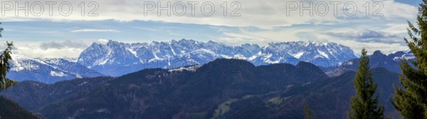 Panoramic view of the snow-covered Alps photographed from the Hochgern summit, at Lake Chiemsee in the Chiemgau Mountains, Bavaria Germany Europe