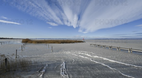 Frozen lake with ice in winter, Lake Neusiedl, Podersdorf am See, Burgenland, Austria, Europe