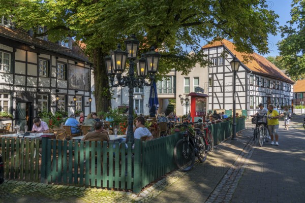 Old village of Westerholt, listed district of Herten Westerholt, over 60 old, well-renovated half-timbered houses form a historic village centre, Alt Westerholt restaurant, beer garden, Herten, North Rhine-Westphalia, Germany, Europe