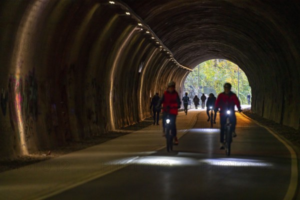 The Nordbahntrasse, a cycle path, footpath, on a former 22 KM long railway line, along the west-east axis of Wuppertal, on the northern slope, with many tunnels, viaducts and views of the city, tunnel passage, Wuppertal, North Rhine-Westphalia, Germany, Europe