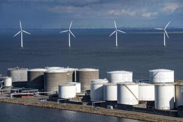 Wind turbines, offshore wind farm east of Copenhagen, in Øresund, tank farm in Prøvestenen harbour, Denmark, Europe