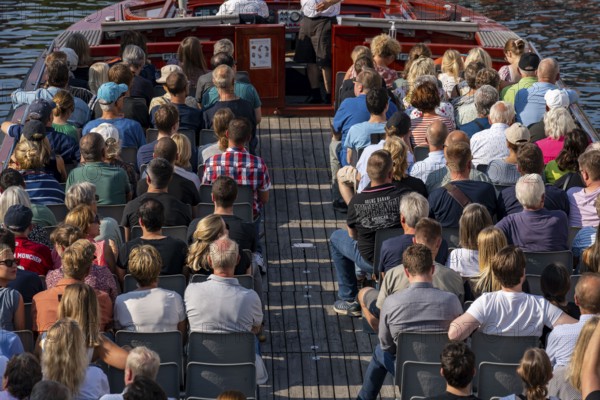 Harbour cruise in an open canal cruise boat, Copenhagen, Denmark, Europe
