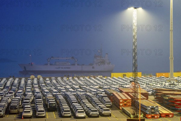 Parking space for import vehicles, hundreds of Hyundai Ioniq, electric cars, waiting for onward transport, at the EUROGATE container terminal in the overseas harbour of Bremerhaven, Lower Saxony, Germany, Europe
