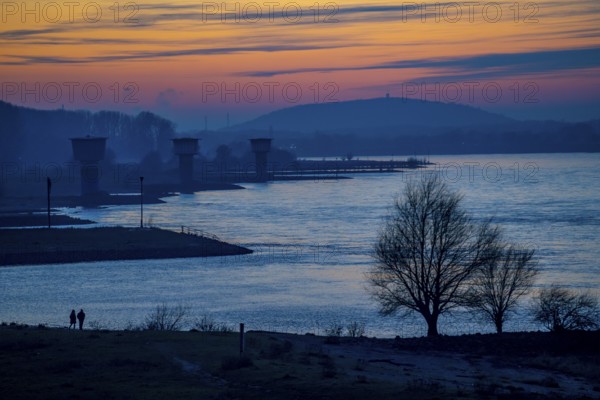 Rhine at Duisburg-Bruckhausen, towers of the water extraction facilities of ThyssenKrupp Steel steelworks, Winter, Duisburg, North Rhine-Westphalia, Germany, Europe