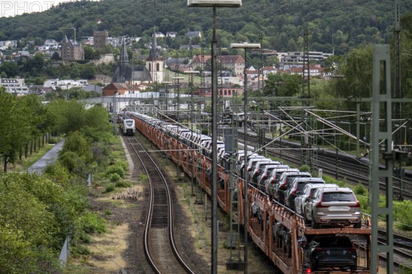 Upper Middle Rhine Valley, goods train, car transporter at Bingen station, waiting for permission to continue its journey, loaded with new Volvo cars, Rhineland-Palatinate, Germany, Europe