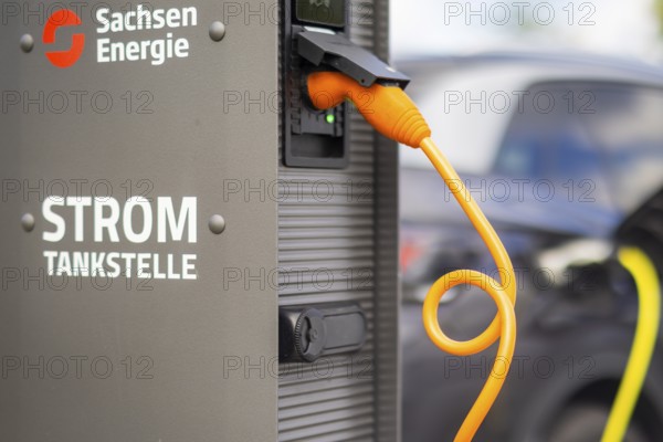 Electric cars at charging stations, Dresden, Saxony, Germany, Europe