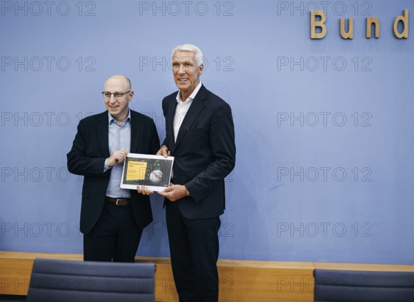 Ralf Wintergerst, Bitkom President and Sinan Selen, Vice President of the Federal Office for the Protection of the Constitution (BfV), at a press conference on the economic protection report at the Federal Press Conference in Berlin, 28 August 2024