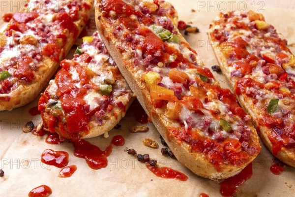 Pizza on a baguette, top view, close-up, no people, fast food, street food