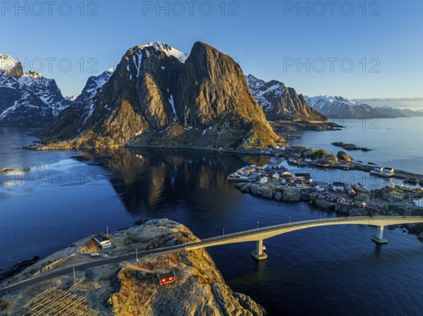Aerial view, bridge, village, steep mountains, coast, winter, fog, evening light, Reine, Moskenesoya, Lofoten, Norway, Europe