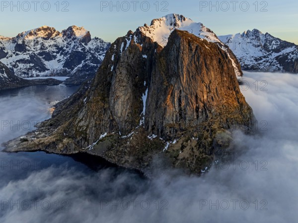 Aerial view, steep mountains, coast, winter, fog, morning light, Reine, Moskenesoya, Lofoten, Norway, Europe