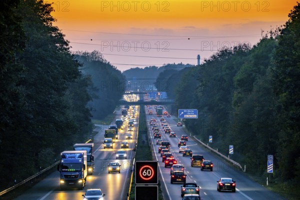 Motorway A40, Ruhrschnellweg, near Bochum, heavy evening traffic, in front of the motorway junction Bochum, A43, view in west direction