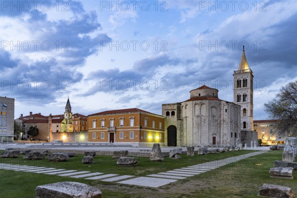 The Church of St Donatus, remains of the Roman forum and the bell tower of Zadar Cathedral at dusk, Croatia, Europe