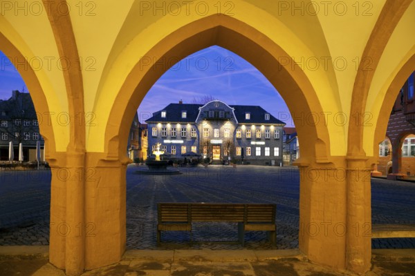 View from the open hall of the late Gothic town hall in Goslar in the evening onto the market square with the Kaiserringhaus, UNESCO World Heritage Site, Lower Saxony, Germany, Europe