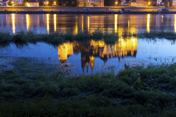 Reflection of Bischofsburg, Albrechtsburg and cathedral in the water of the Elbe at blue hour, Meissen, Saxony, Germany, Europe