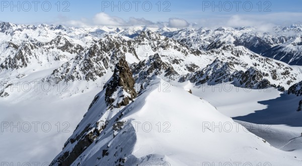 View of mountain panorama in winter on Piz Kesch with glacier Vadret da Porchabella, high tour, ski tour Bündner Haute Route, Albula Alps, Rhaetian Alps, Grisons, Eastern Switzerland, Switzerland, Europe