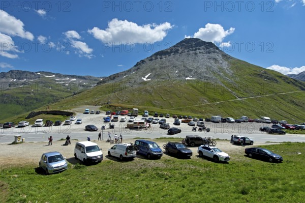 Car park with cars at the top of the Furka Pass, Goms, Valais, Switzerland, Europe