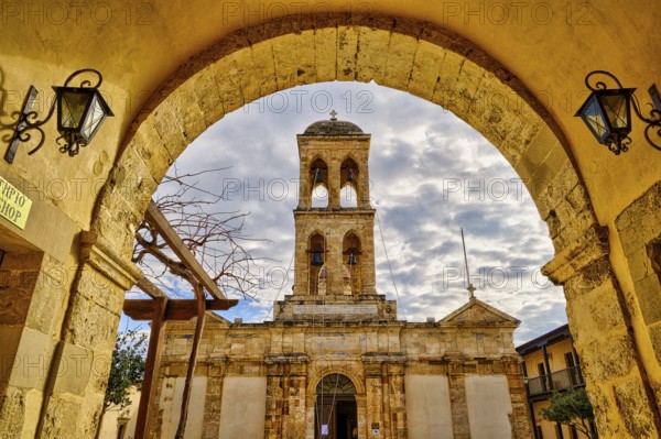 HDR, entrance arch, lanterns, main church, cloudy sky, Panagias, Odigitrias, Gonias, Orthodox Monastery, Crete, Greece, Europe