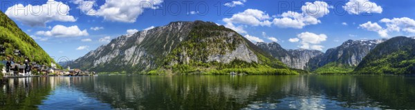 Austrian tourist destination, panorama of Hallstatt village and Hallstatter See mountain lake in Austria in Austrian alps. Salzkammergut region, Austria, Europe