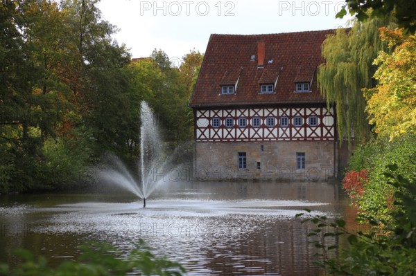 Remains of Rosenau Castle, from 1435, also called Rosenau Castle, of the mint masters Heinz and Günther von Rosenau, on the knight's pond, half-timbered house, today state building authority in Coburg, Upper Franconia, Bavaria, Germany, Europe