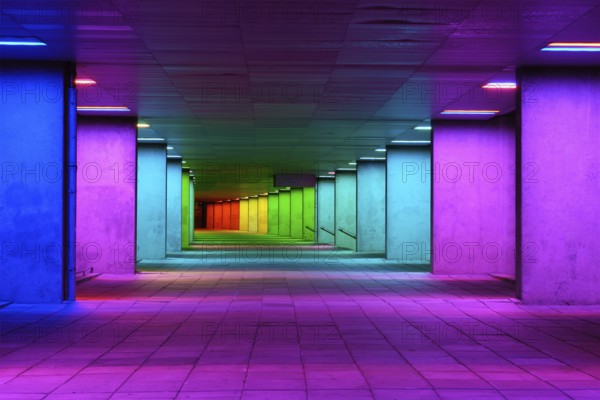 ROTTERDAM, NETHERLANDS, MAY 11, 2017: Colorful mulitcolored illuminated gallery tunnel rainbow passage installation under NAI building, Nederlands Architecture Institute near MuseumPark, Rotterdam