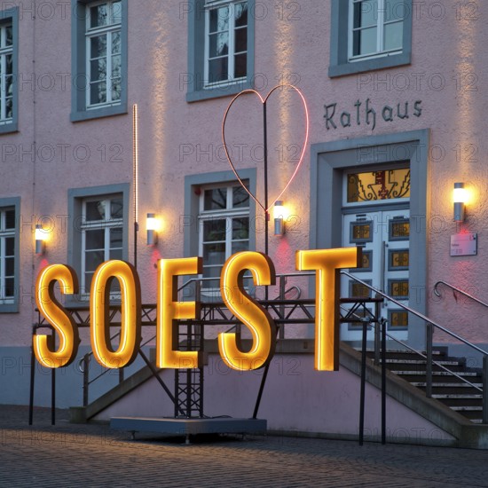 Illuminated town hall in the early evening at the Winterstrahlen Festival of Lights in Soest, North Rhine-Westphalia, Germany, Europe