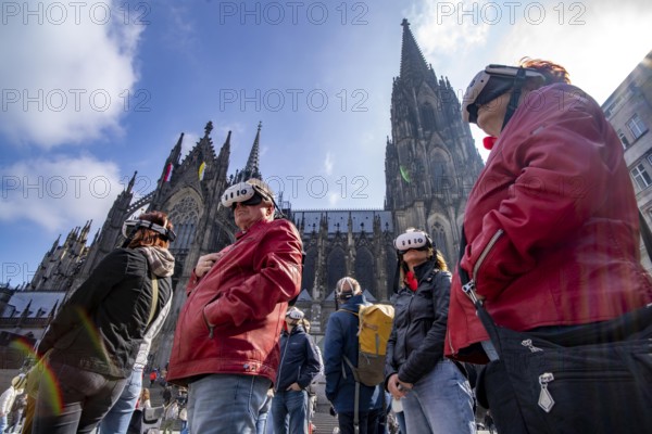 Timeridego, virtual city tour with VR glasses, on various topics, virtual reality time travel into the past of Cologne, here at Cologne Cathedral, North Rhine-Westphalia, Germany, Europe