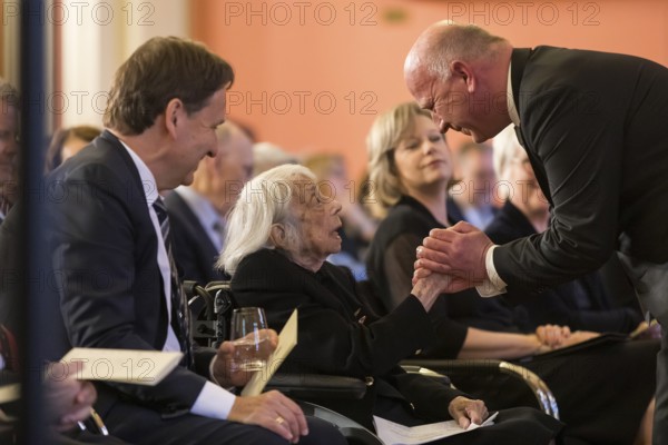 Margot Friedländer (Holocaust survivor and honorary citizen of the city of Berlin) is greeted by Kai Wegner (Governing Mayor of Berlin) at the commemorative event of the Senate and Berlin House of Representatives on the 80th anniversary of the end of the Second World War, Berlin, 07.05.2025