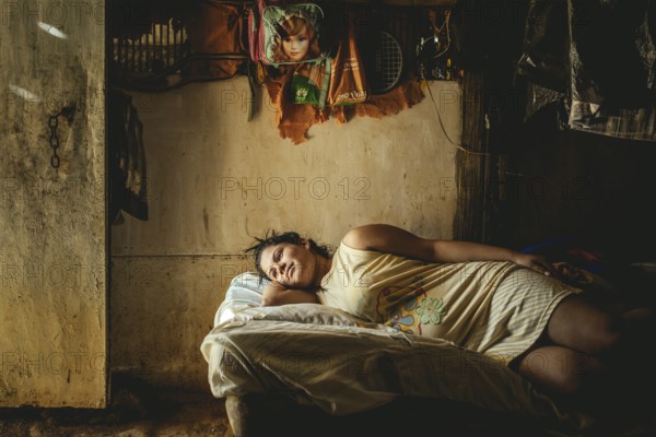 Rosalba, 18 years old, was recruited into prostitution at 14, last year she became pregnant, she is 8 months pregnant. She is currently living back in her family's hut in Túrgua, Venezuela, South America