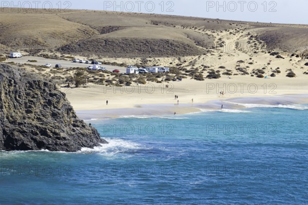 Papagayo beach with blue sea and dunes in a secluded coastal landscape, Playa Blanca, Lanzarote, Canary Islands, Spain, Europe