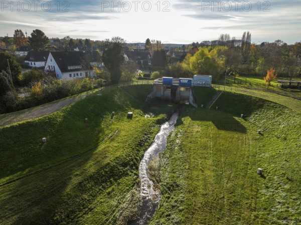 Dortmund, North Rhine-Westphalia, Germany, Renaturalised Emscher in Dortmund Aplerbeck. The river was transformed into a near-natural watercourse, flood protection and biodiversity through newly designed floodplains, here in the flood retention basin HRB Dortmund Nagelpötchen. Following the construction of a parallel sewer, the Emscher is now free of wastewater, having previously been an open, above-ground wastewater sewer, combined sewer with surface water and wastewater, Europe