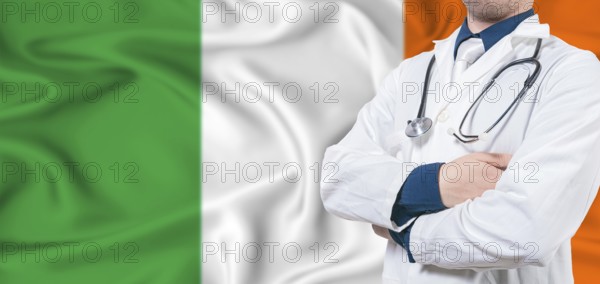 Ireland health care concept. Male doctor on Ireland flag. Doctor with crossed arms on Ireland flag
