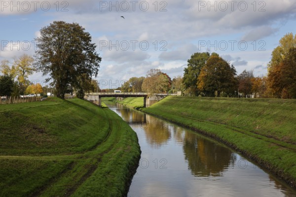 28.10.2020, Oberhausen, Ruhr area, North Rhine-Westphalia, Germany - Emscher, in this not yet renaturalised river section wastewater is still discharged, with the Emscher conversion this area will soon also be renaturalised, ecologically improved, the ecological conversion of the Emscher system consists of the construction of a central wastewater treatment system in the Ruhr area, the construction of sewers and the renaturation of the Emscher and its tributaries 00X201028D035CARO (MODEL RELEASE: NO, PROPERTY RELEASE: NO (c) caro images / Rupert Oberhaeuser, http://www.caro-images.com, info@caro-images.com - If the photo is used for purposes other than journalism, please contact the agency - any use of the photo is subject to a fee)