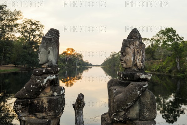 Figures on the bridge to Angkor Thom, sunset, Angkor Wat, Angkor, UNESCO World Heritage Site, Siem Reap, Cambodia, Indochina, Southeast Asia, Asia
