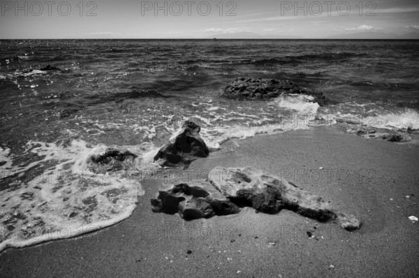 Rocks on the beach of Nea Kallikratia, Chalkidiki, Halkidiki, Macedonia, black and white, Greece, Europe