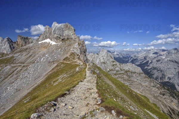 A narrow hiking trail leads over a mountain ridge, Karwendel, Mittenwald, Bavaria, Germany, Europe