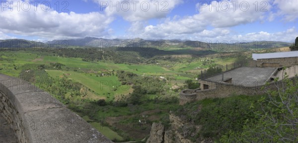 View to the west from the Puente Nuevo, New Bridge, Ronda, Malaga, Spain, Europe